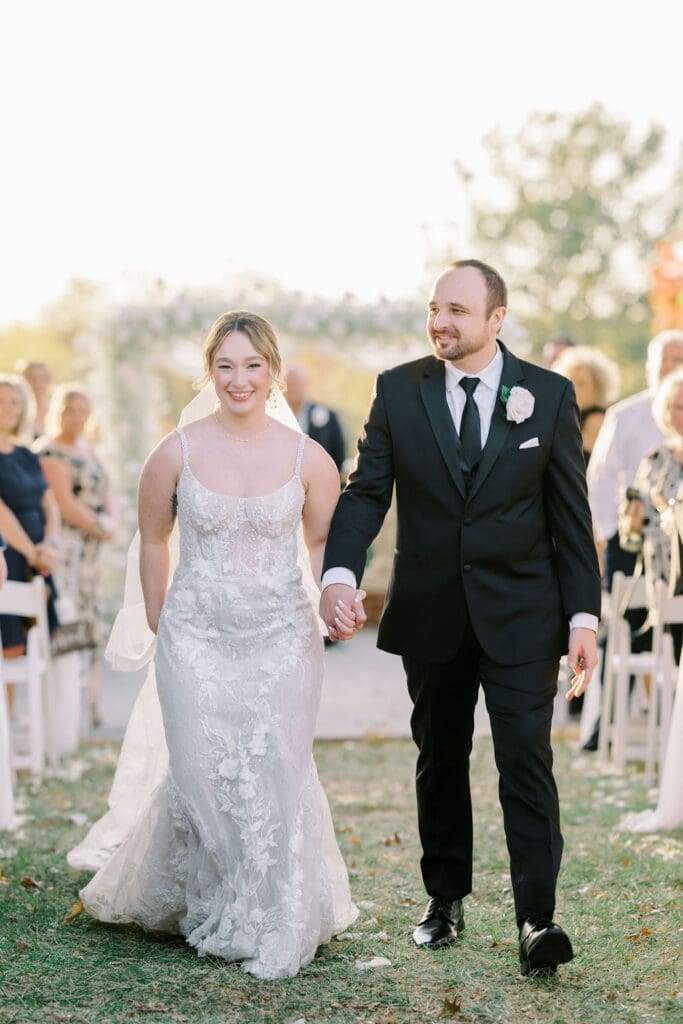 Candid wedding ceremony moments with guests celebrating