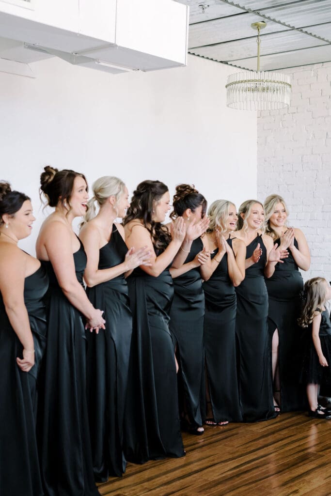 bridesmaid first look with bride at kansas city wedding venue